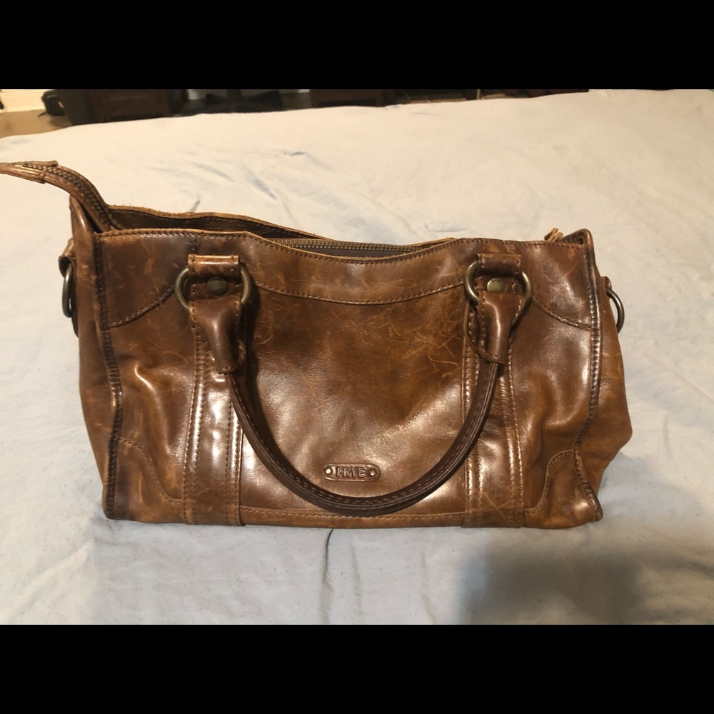A brown Frye bag